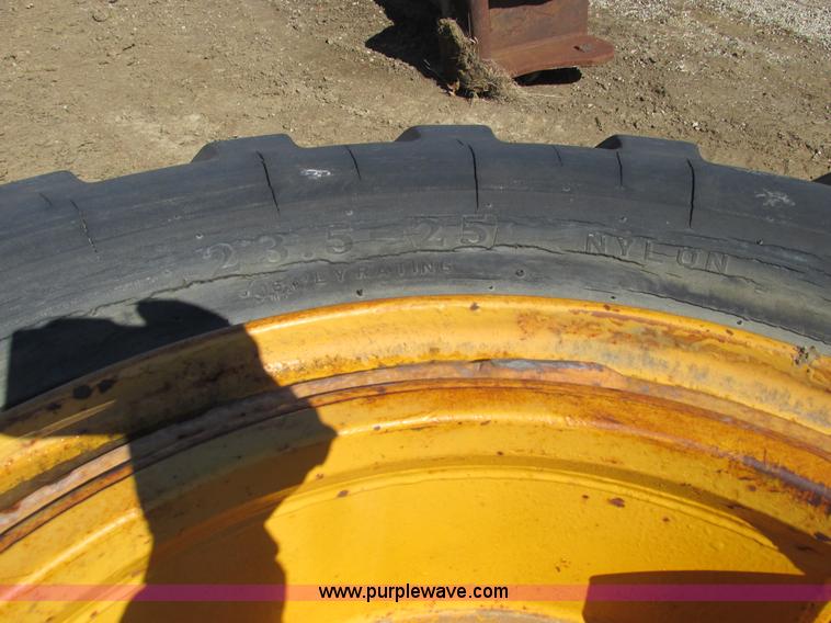 image for item X9869 Two tires and rear frame/punched off of pull-type scraper