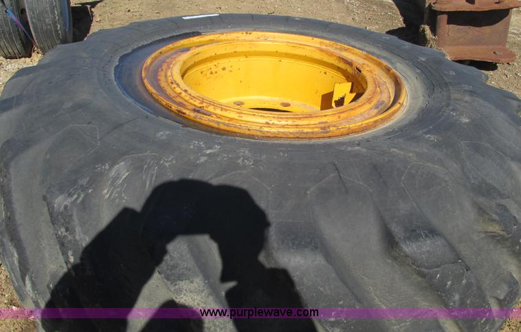 image for item X9869 Two tires and rear frame/punched off of pull-type scraper