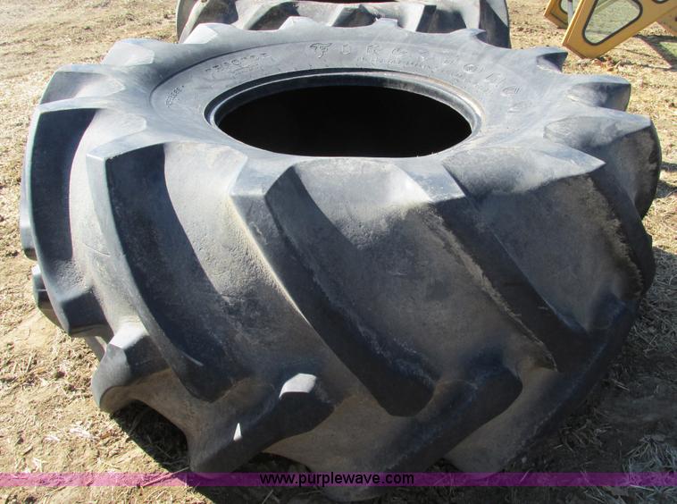 image for item X9883 Pair of used Firestone Champion 35.5L32 spade grip tires