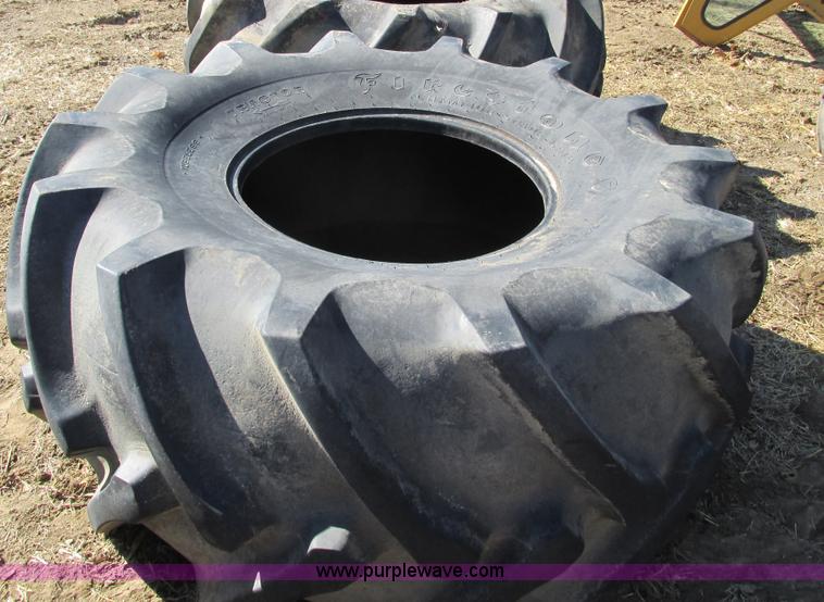 image for item X9883 Pair of used Firestone Champion 35.5L32 spade grip tires