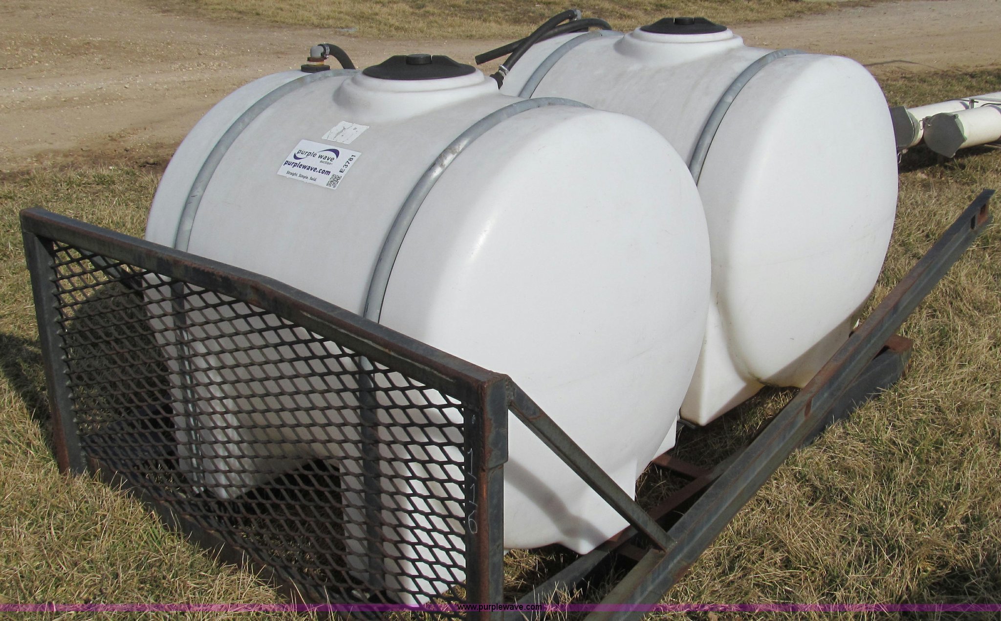 (2) front mounted tractor spray tanks in Fulton, MO Item E3781 sold