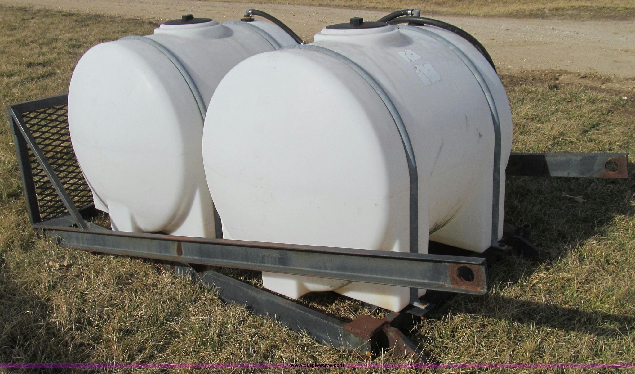 (2) front mounted tractor spray tanks in Fulton, MO Item E3781 sold