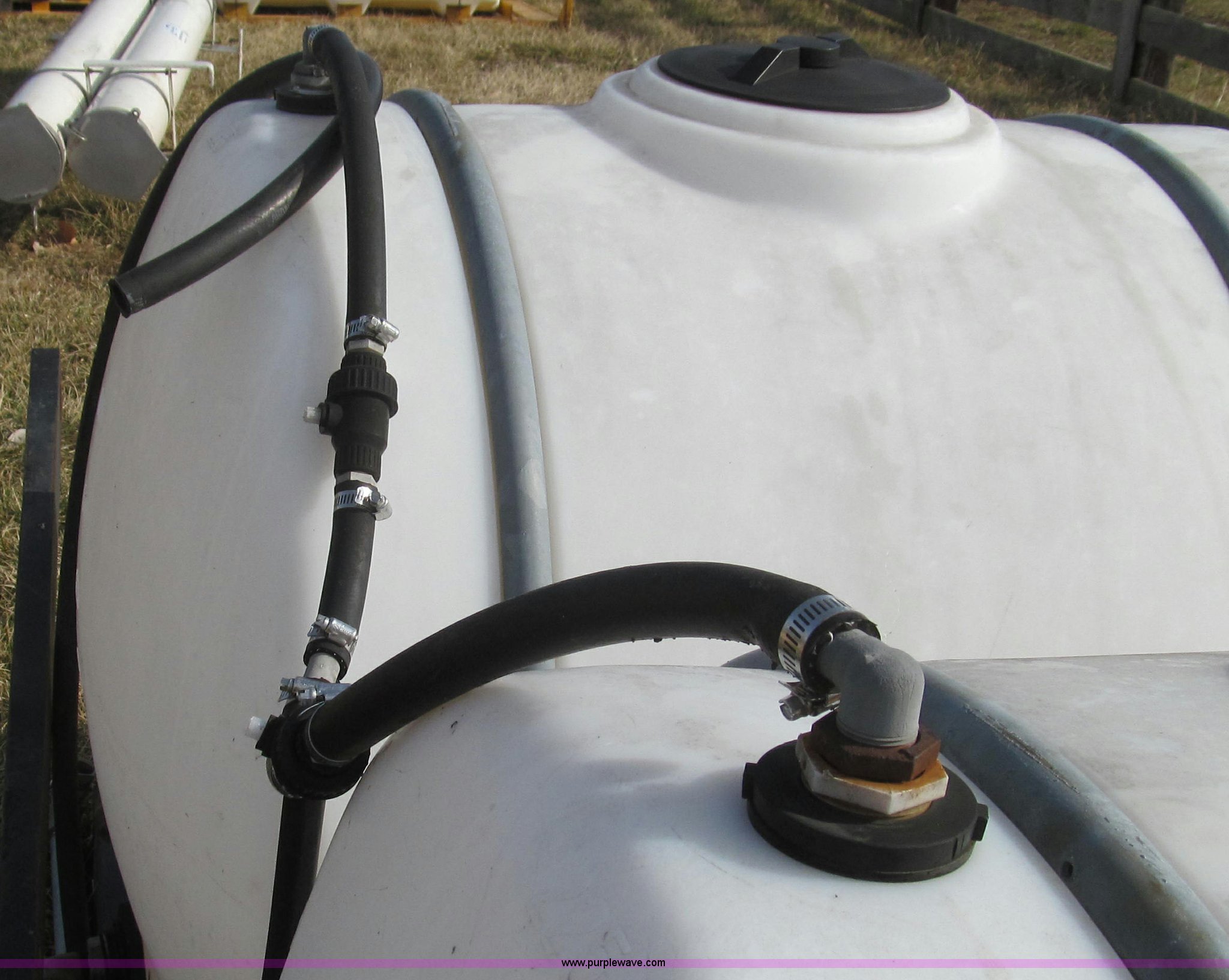 (2) front mounted tractor spray tanks in Fulton, MO Item E3781 sold
