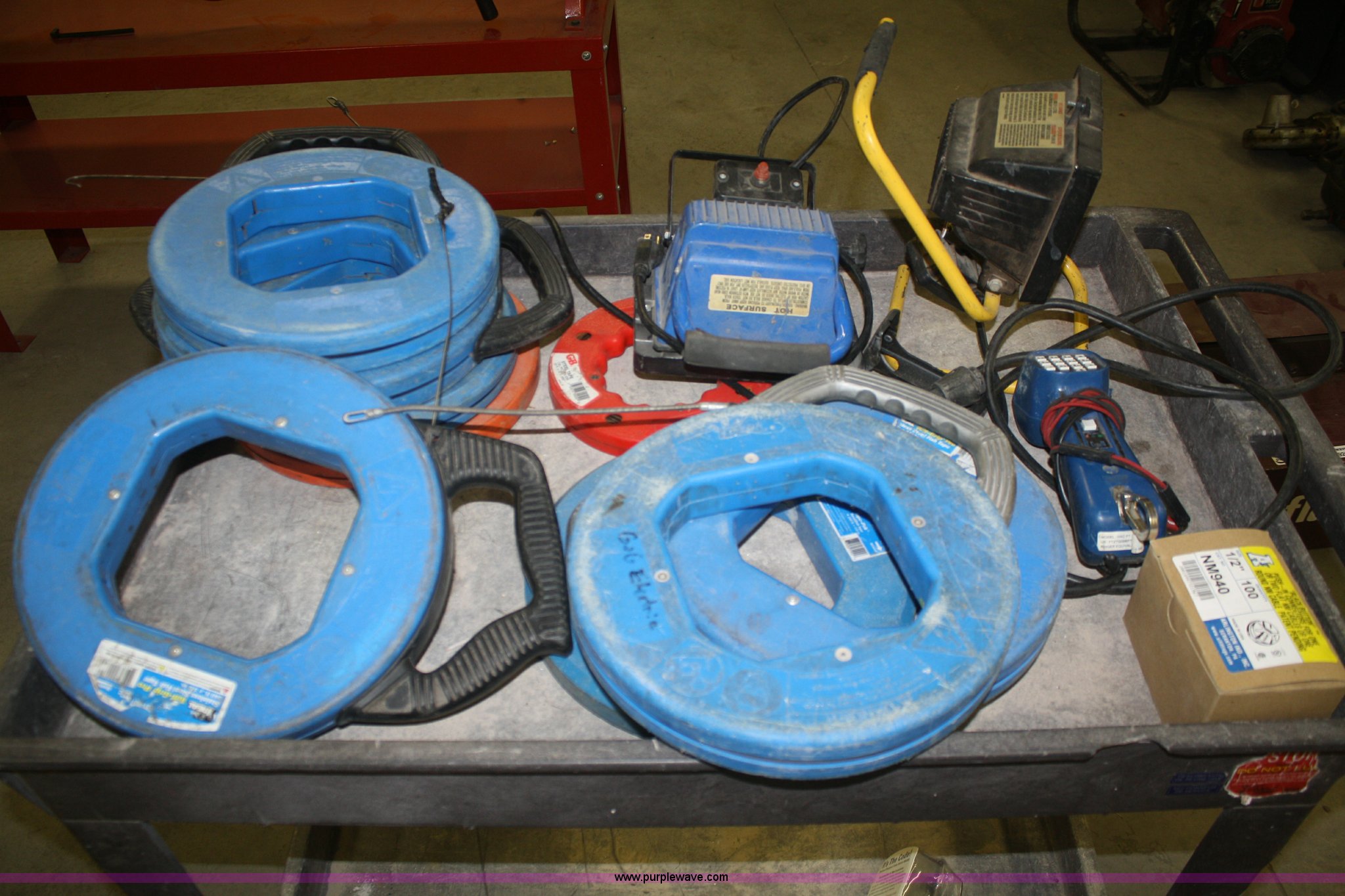 Cart and assorted fish tape in Rossville, KS Item S9928 sold Purple