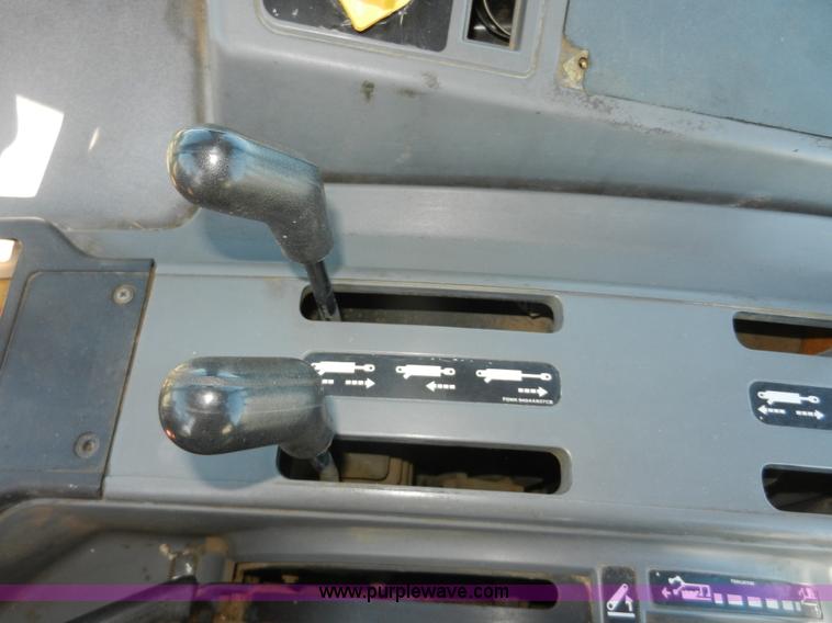 image for item F2961 1998 New Holland 6640SL tractor