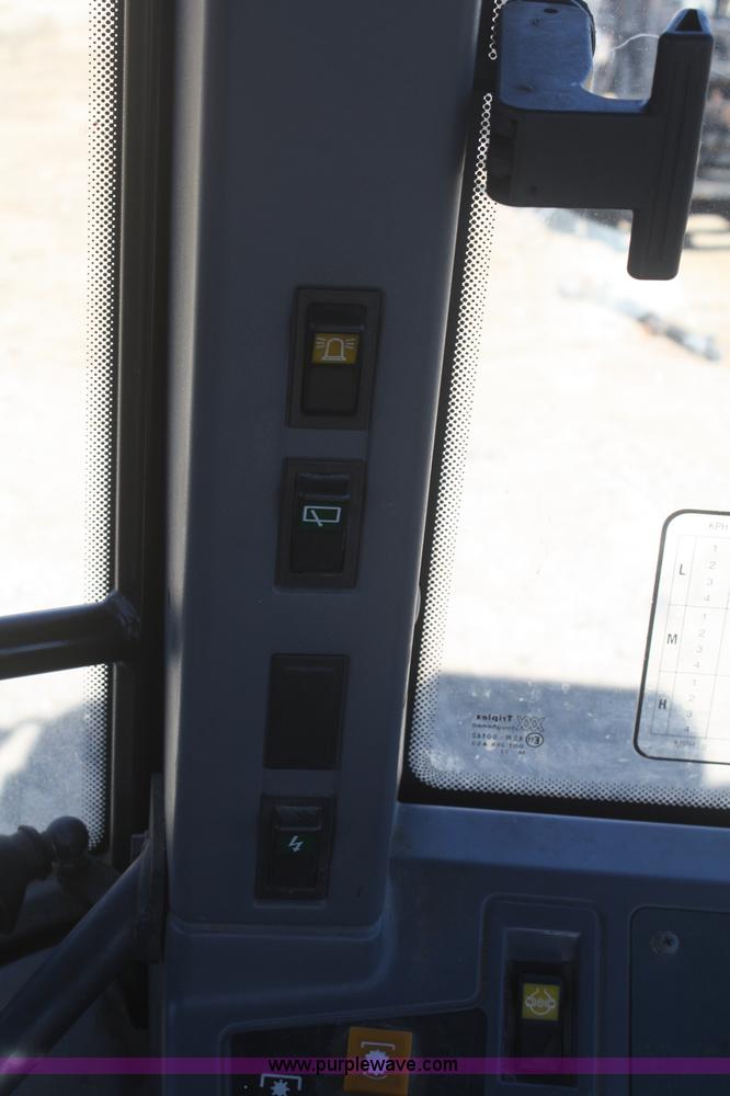 image for item F2963 1997 New Holland 6640SL tractor