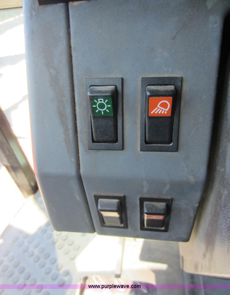 image for item G4814 1998 New Holland 6640SL tractor