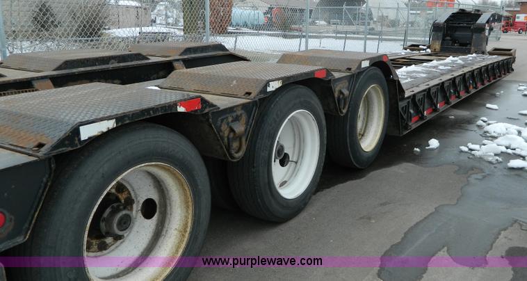 image for item G7706 2002 Trail King TK110HDG-483 triple axle lowboy trailer