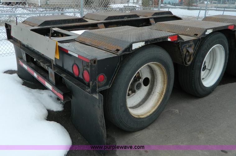 image for item G7706 2002 Trail King TK110HDG-483 triple axle lowboy trailer