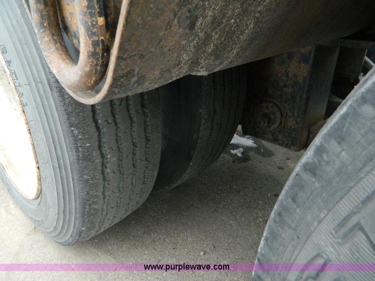 image for item G7706 2002 Trail King TK110HDG-483 triple axle lowboy trailer