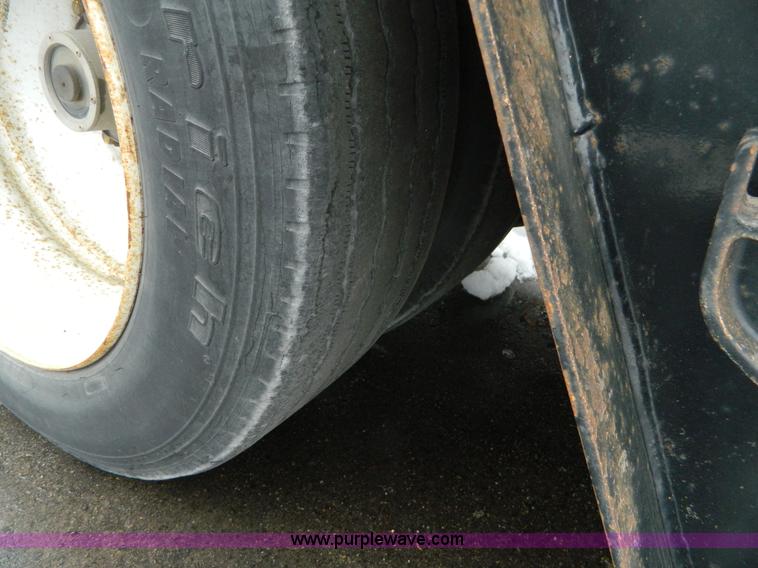 image for item G7706 2002 Trail King TK110HDG-483 triple axle lowboy trailer