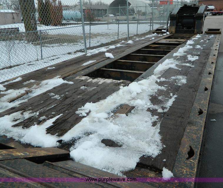 image for item G7706 2002 Trail King TK110HDG-483 triple axle lowboy trailer