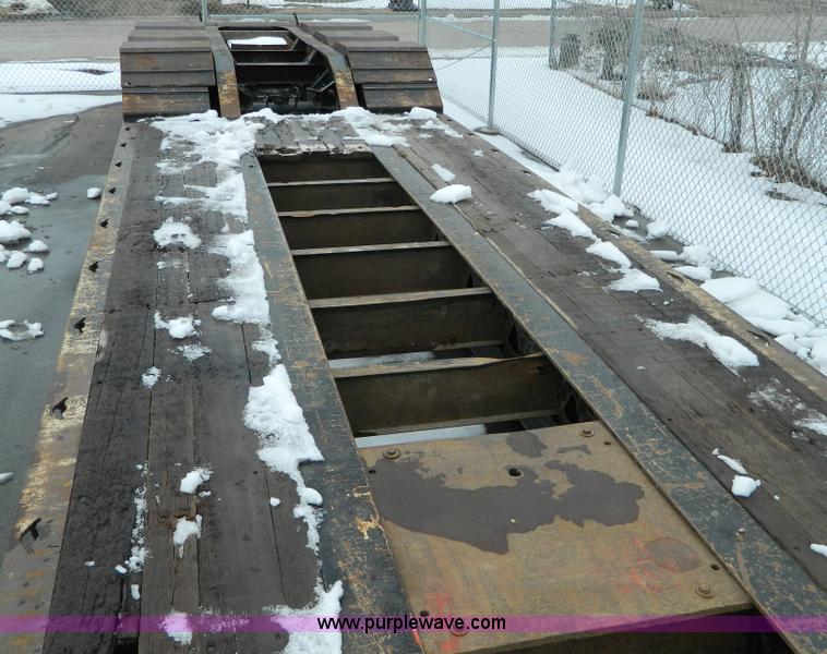 image for item G7706 2002 Trail King TK110HDG-483 triple axle lowboy trailer