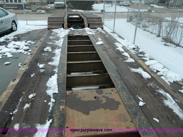 image for item G7706 2002 Trail King TK110HDG-483 triple axle lowboy trailer