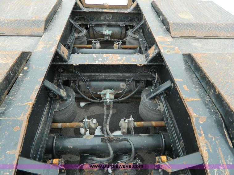 image for item G7706 2002 Trail King TK110HDG-483 triple axle lowboy trailer