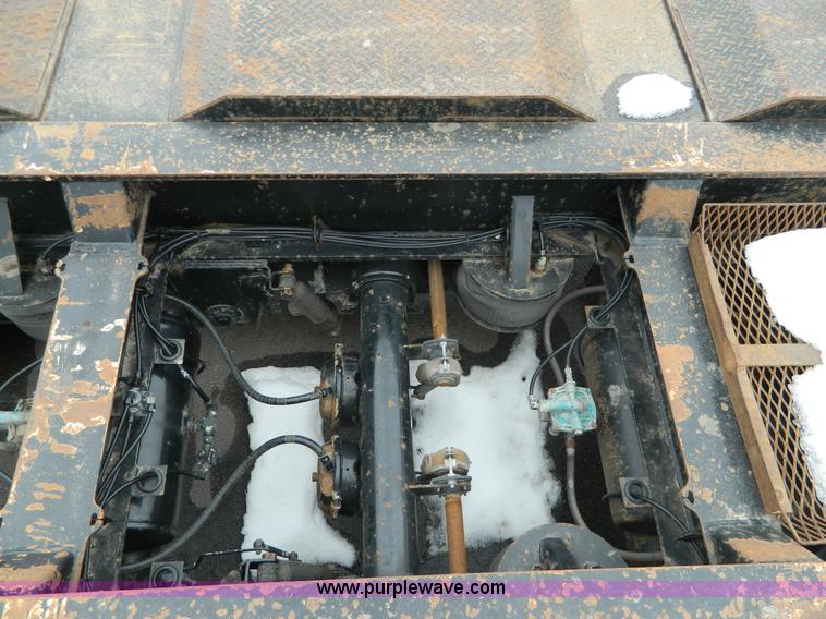 image for item G7706 2002 Trail King TK110HDG-483 triple axle lowboy trailer