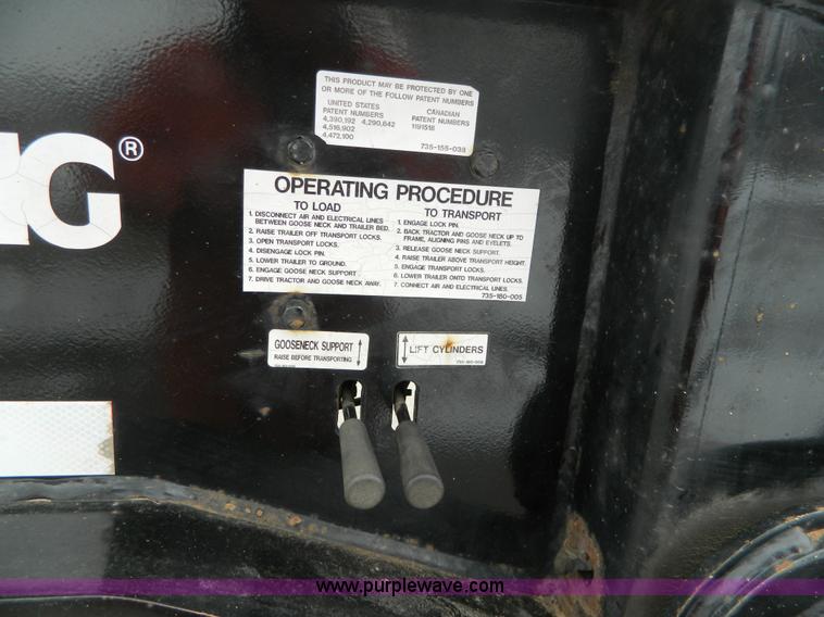 image for item G7706 2002 Trail King TK110HDG-483 triple axle lowboy trailer