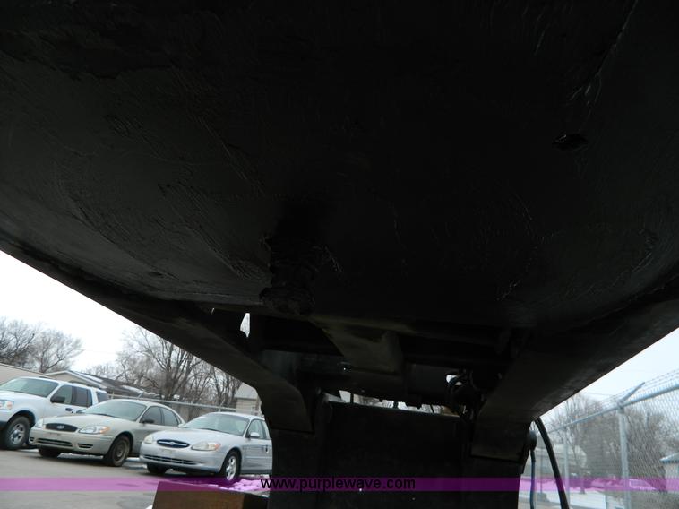 image for item G7706 2002 Trail King TK110HDG-483 triple axle lowboy trailer