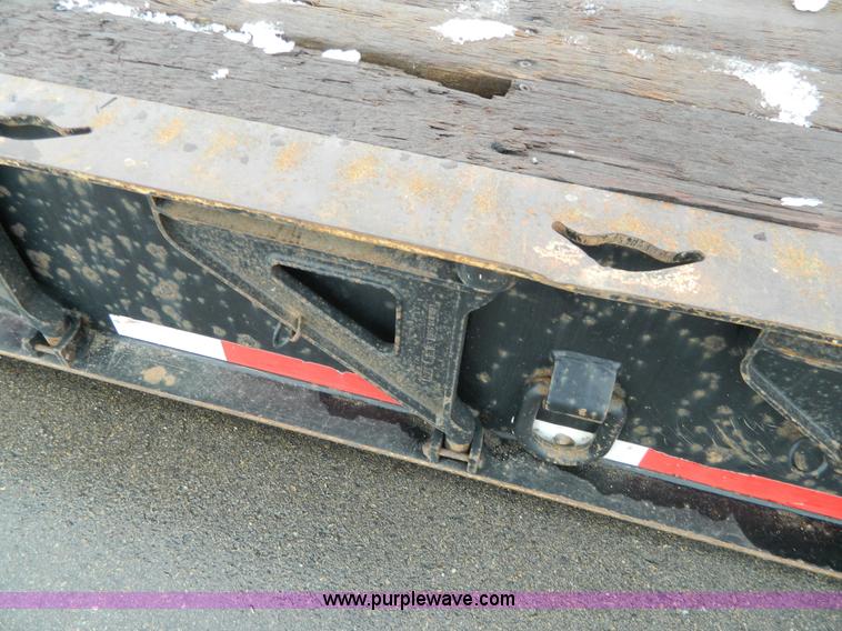 image for item G7706 2002 Trail King TK110HDG-483 triple axle lowboy trailer