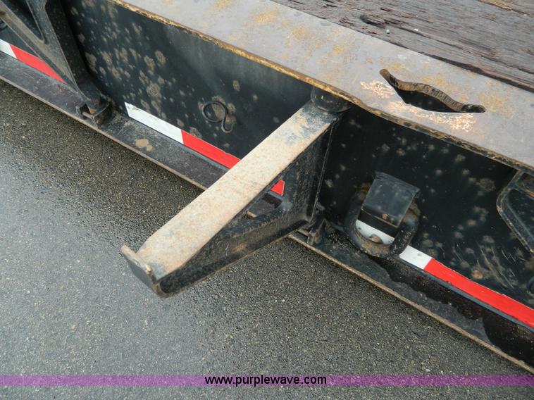 image for item G7706 2002 Trail King TK110HDG-483 triple axle lowboy trailer