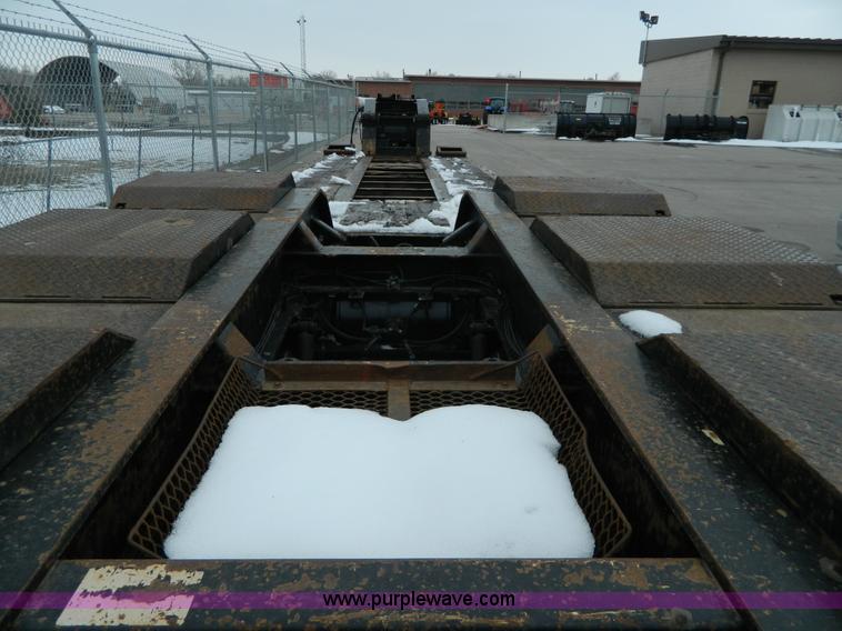 image for item G7706 2002 Trail King TK110HDG-483 triple axle lowboy trailer