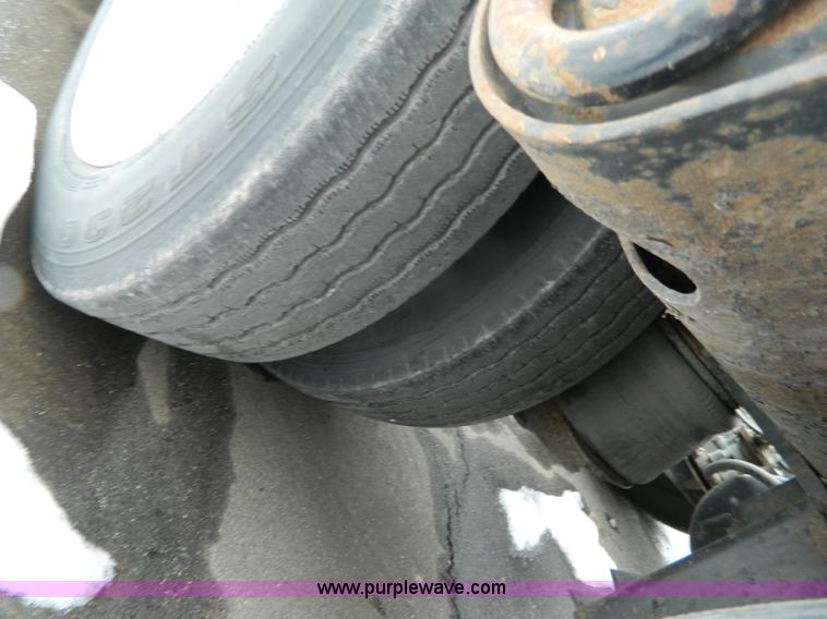 image for item G7706 2002 Trail King TK110HDG-483 triple axle lowboy trailer