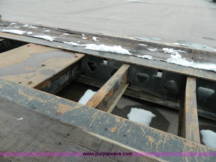 image for item G7706 2002 Trail King TK110HDG-483 triple axle lowboy trailer