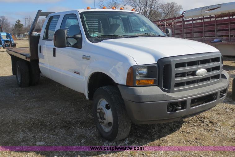 image for item F6611 2005 Ford F350 Super Duty Crew Cab flatbed truck