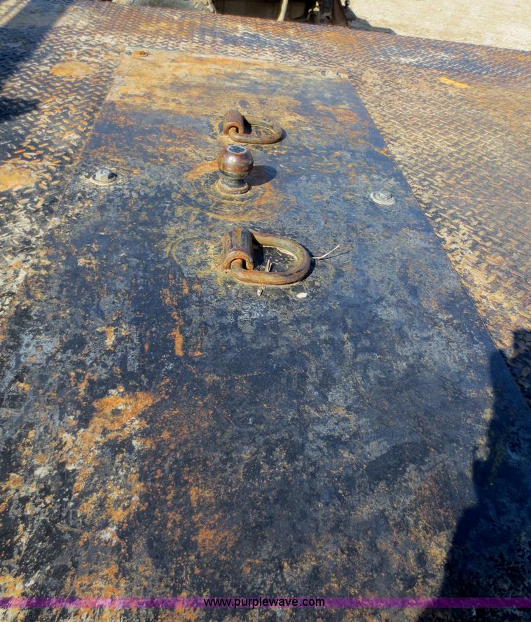 image for item F6611 2005 Ford F350 Super Duty Crew Cab flatbed truck