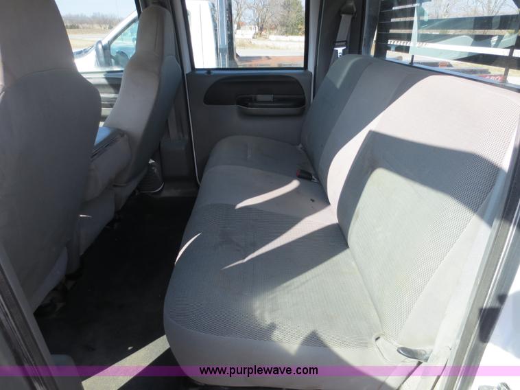 image for item F6611 2005 Ford F350 Super Duty Crew Cab flatbed truck