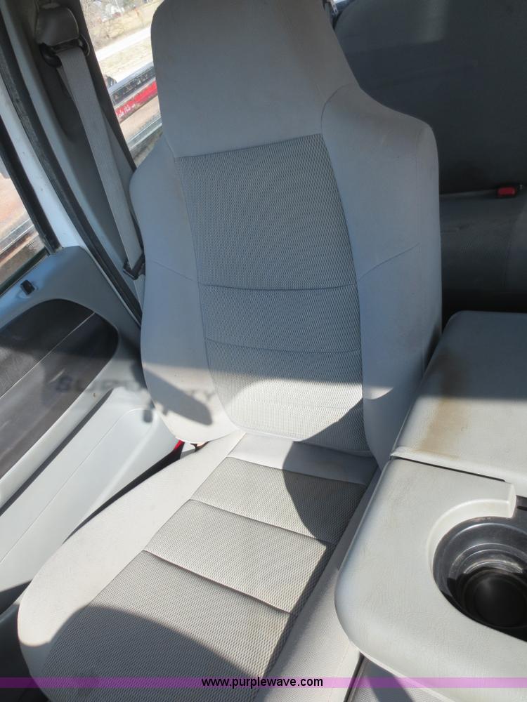 image for item F6611 2005 Ford F350 Super Duty Crew Cab flatbed truck