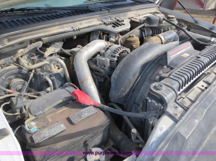 image for item F6611 2005 Ford F350 Super Duty Crew Cab flatbed truck