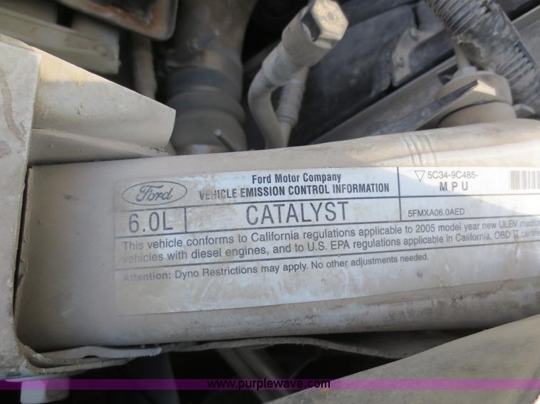 image for item F6611 2005 Ford F350 Super Duty Crew Cab flatbed truck