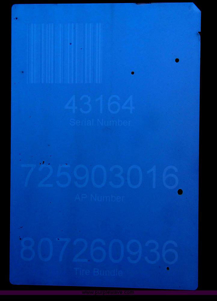 image for item G7731 2004 New Holland BR780 round baler