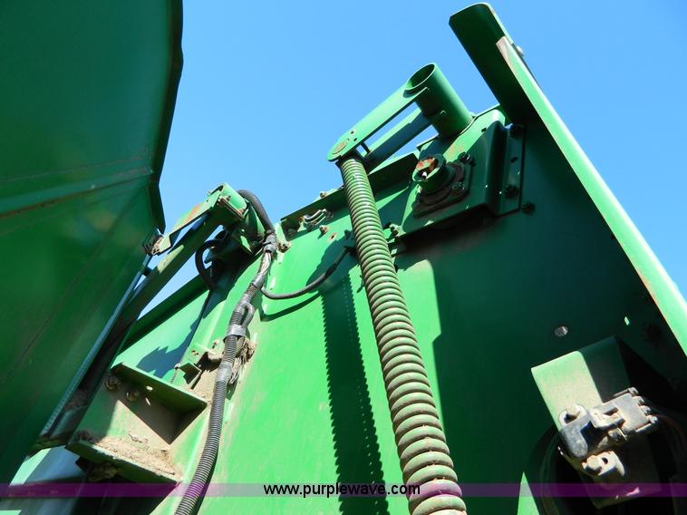 image for item G7767 1997 John Deere 566 baler