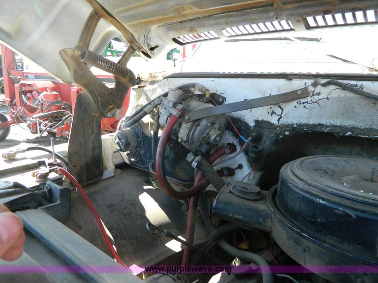 image for item G7772 1985 Chevrolet C60 feed truck