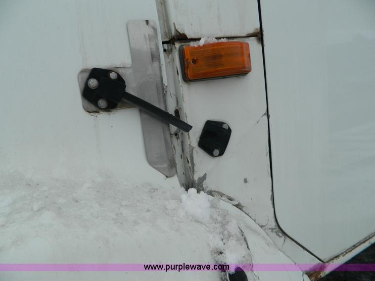 image for item W9122 1996 International 4700 flatbed truck