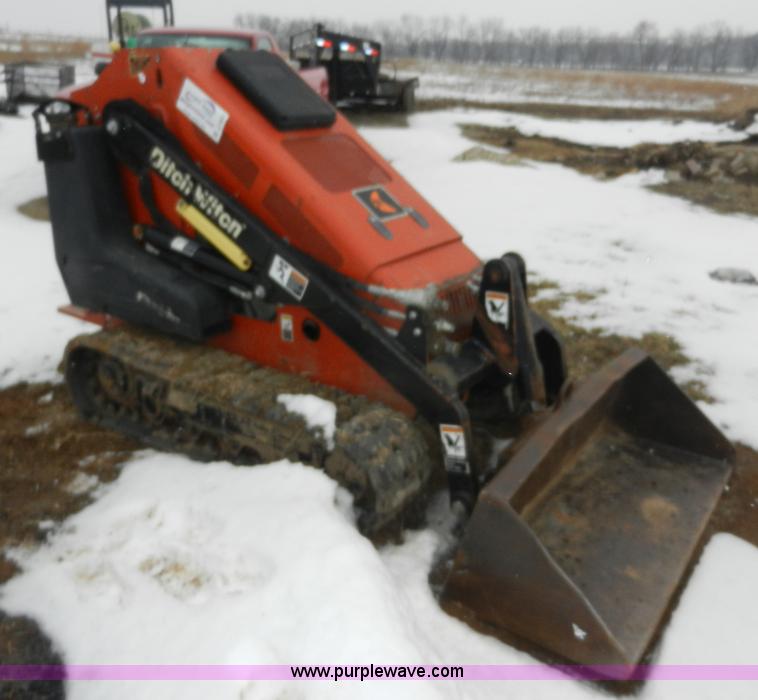 image for item A3932 2008 Ditch Witch SK650 walk behind track loader