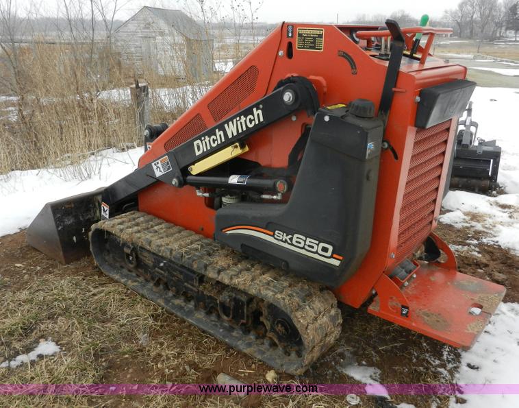 image for item A3932 2008 Ditch Witch SK650 walk behind track loader