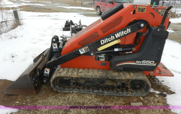 image for item A3932 2008 Ditch Witch SK650 walk behind track loader