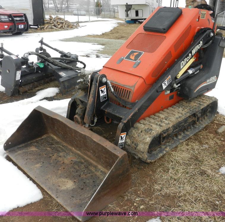 image for item A3932 2008 Ditch Witch SK650 walk behind track loader
