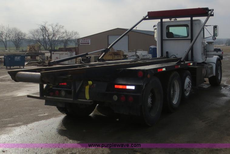 image for item D5765 1993 Peterbilt 357 roll off truck