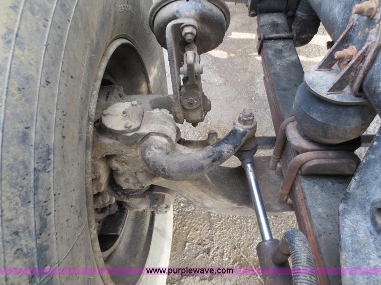 image for item D5765 1993 Peterbilt 357 roll off truck