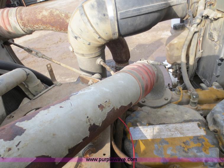 image for item D5765 1993 Peterbilt 357 roll off truck