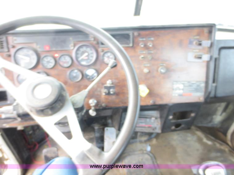 image for item D5765 1993 Peterbilt 357 roll off truck