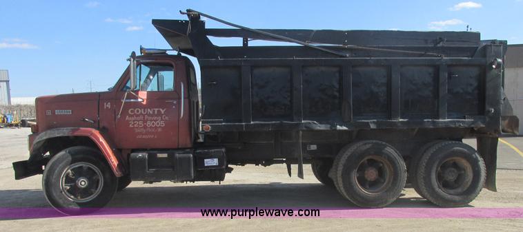 image for item E7100 1984 GMC Brigadier dump truck