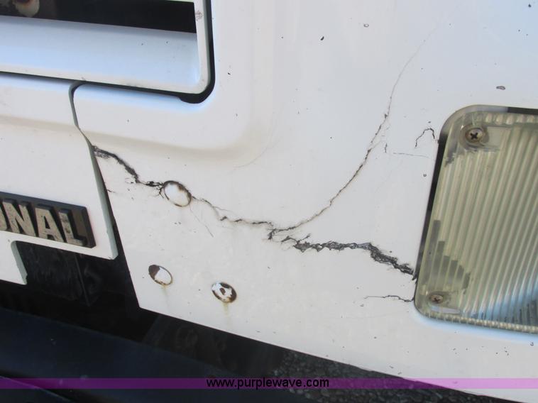 image for item E7109 1997 International 4700 bucket truck