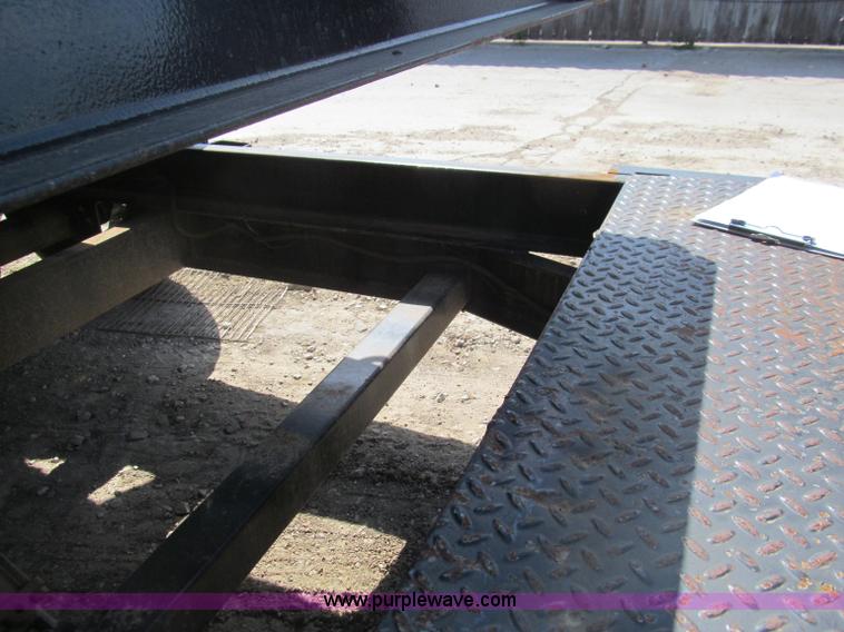 image for item F3152 2010 Texas Bragg tilt deck trailer