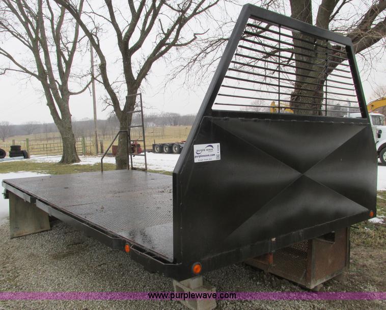 image for item F4396 Approximately 16'L x 8' flatbed