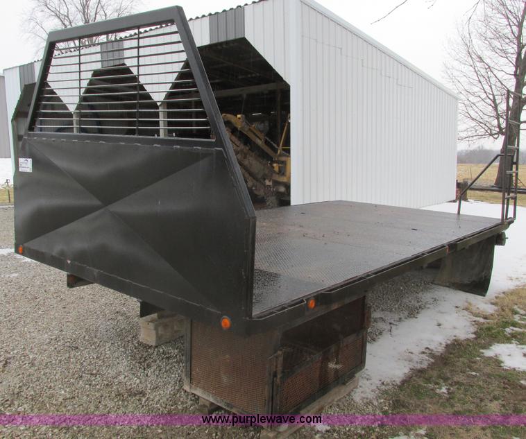 image for item F4396 Approximately 16'L x 8' flatbed